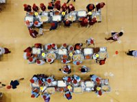 Students from across the Southcoast work in teams to create over ten thousand hunger relief food bags, as part of the at the annual Civic Youth Summit held at UMass Dartmouth.   PETER PEREIRA/THE STANDARD-TIMES/SCMG